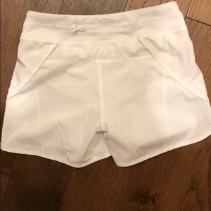 White Ivivva Shorts.